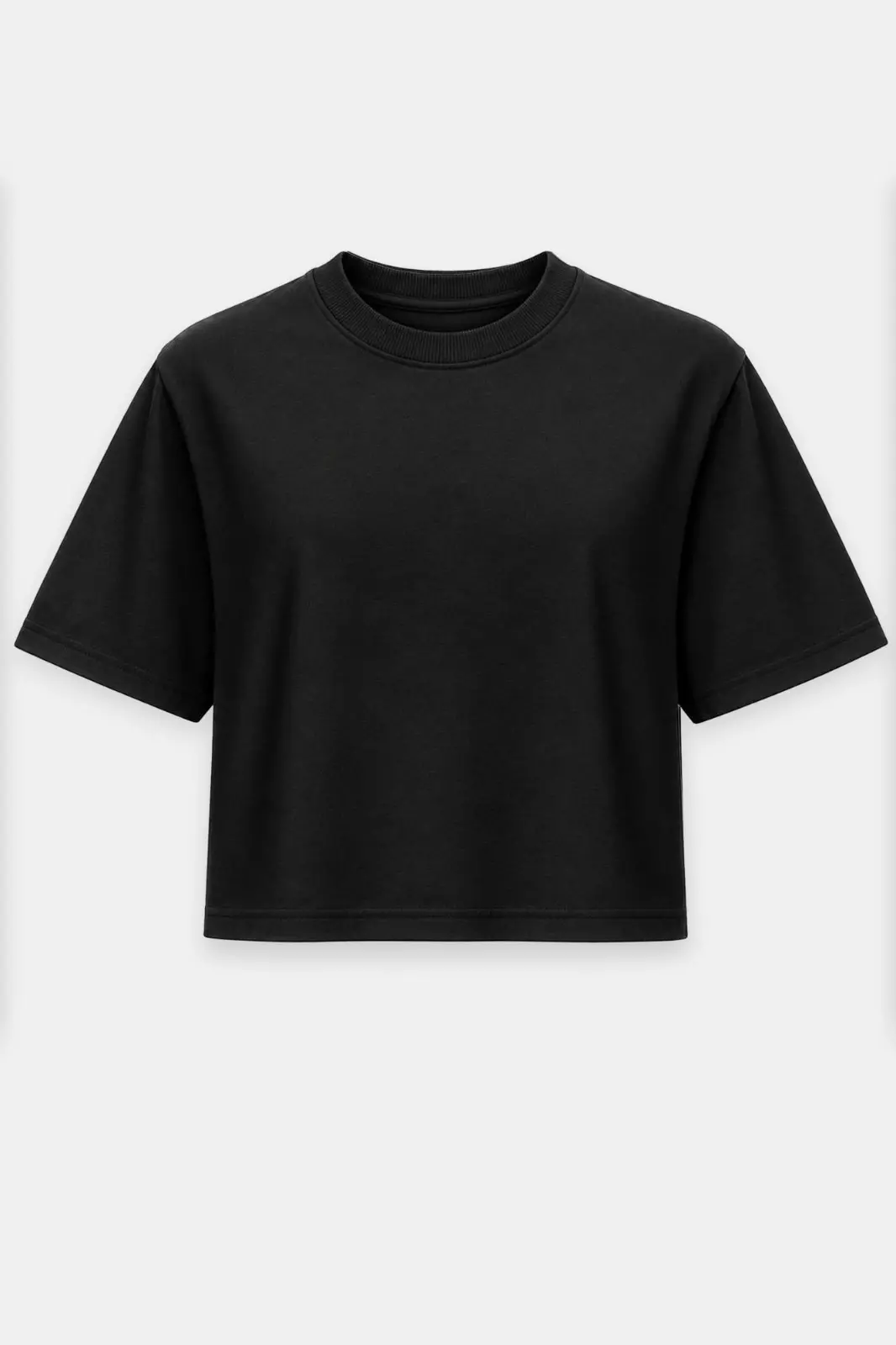 Czarny T-shirt damski VENA o krótszym luźnym kroju z poduszkami na ramionach, wykonany z grubej bawełny premium.